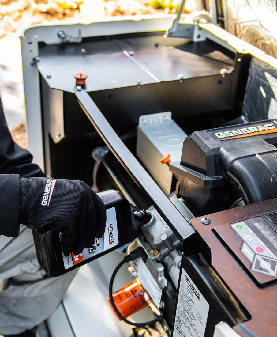 Orillia Generac Certified Installers performing maintenance on a Generac Generator